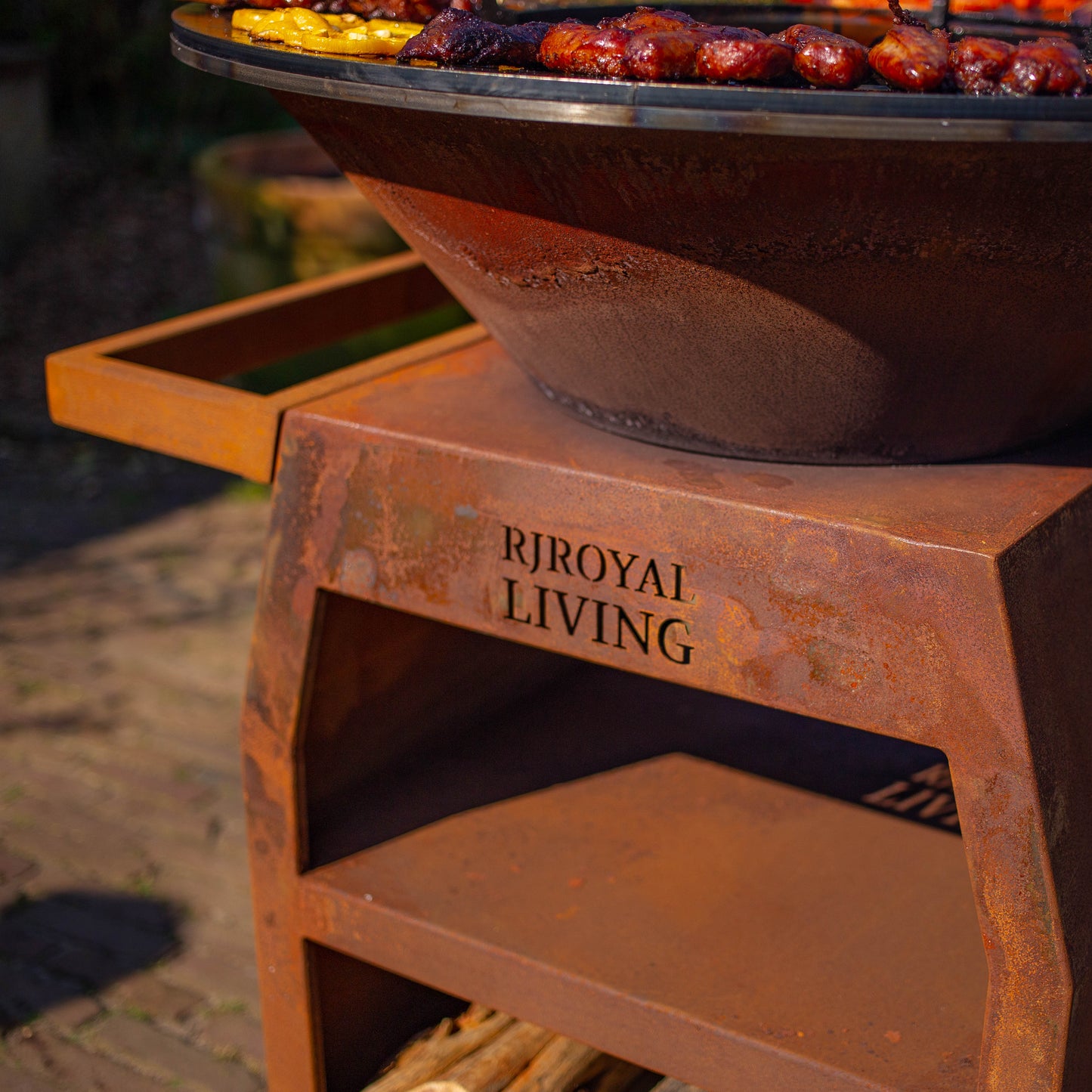 BBQ Plancha Grill Maestro Ø70cm Acier Corten - Avec grandes roues et compartiment à bois