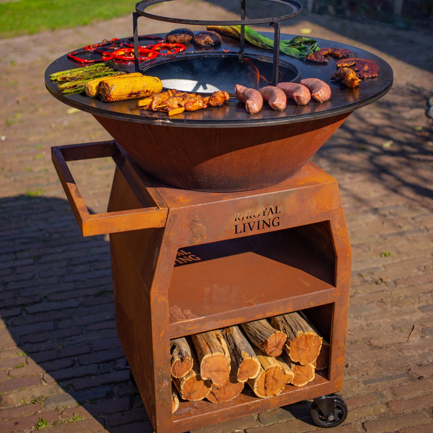 Barbecue Plancha Grill Maestro XXL Ø80cm Acier Corten - Avec tisonnier et rangement pour le bois