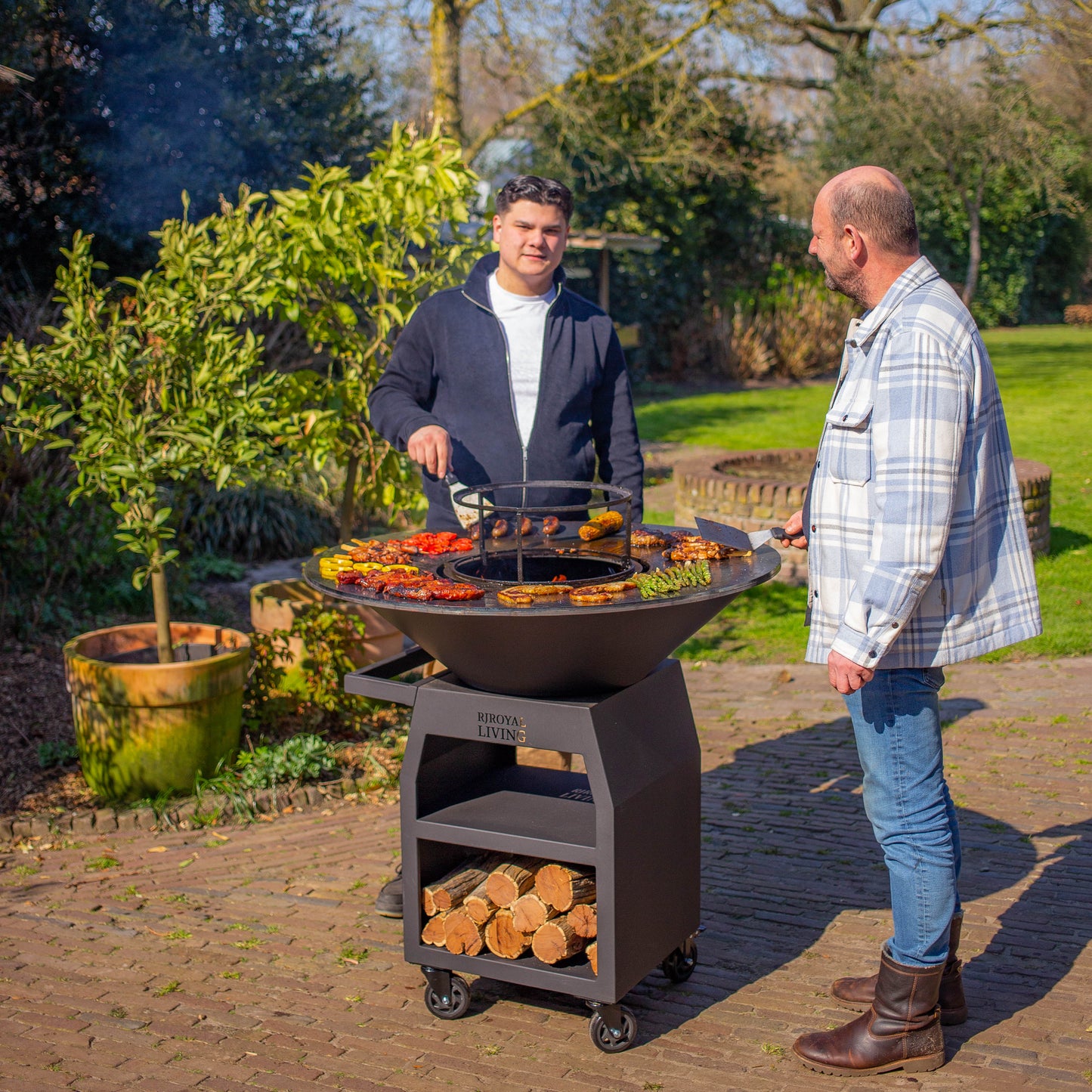 BBQ Plancha Grill Maestro XXXL Ø100cm Blackline - Avec grandes roues et rangement pour le bois