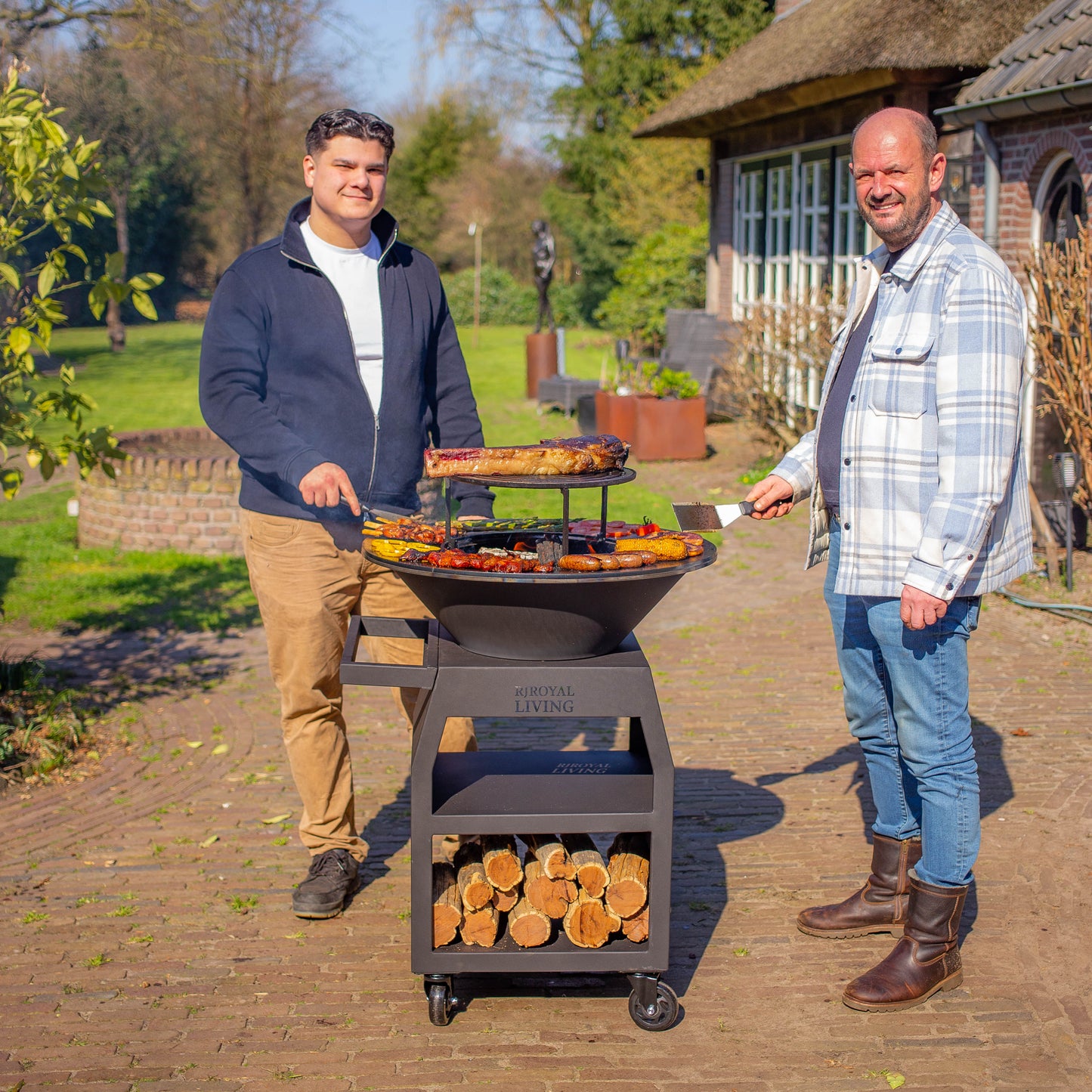 BBQ Plancha Grill Maestro Ø70cm Blackline - Avec grandes roues et compartiment à bois