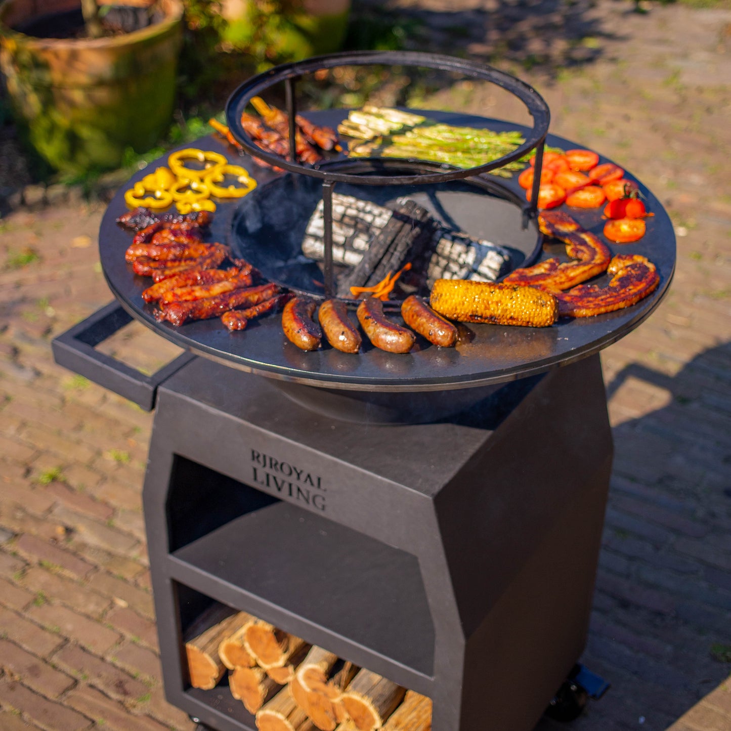 BBQ Plancha Grill Maestro Ø70cm Blackline - Avec grandes roues et compartiment à bois
