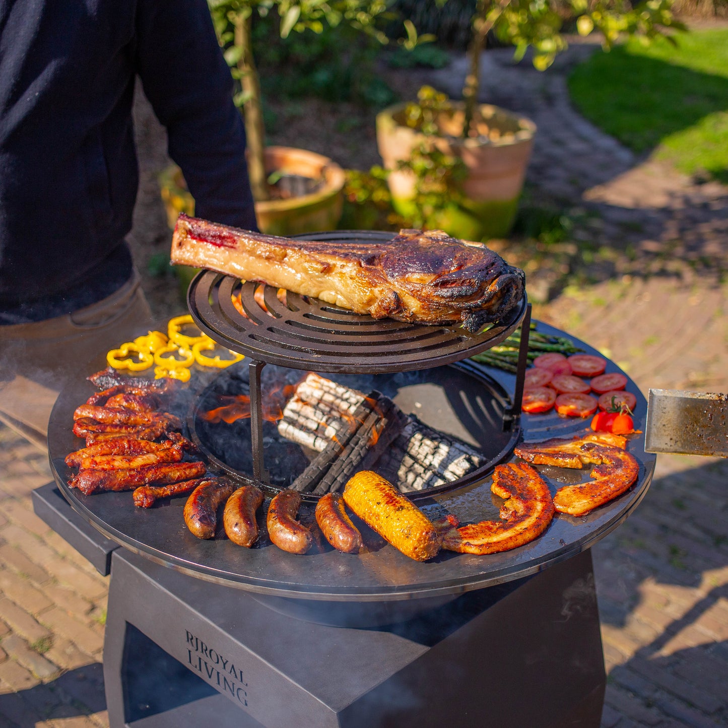 BBQ Plancha Grill Maestro Ø70cm Blackline - Avec grandes roues et compartiment à bois