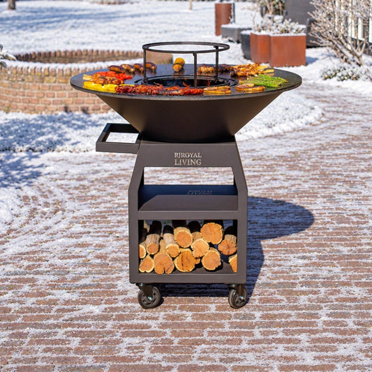 BBQ Plancha Grill Maestro XXXL Ø100cm Blackline - Avec grandes roues et rangement pour le bois — ambiance hivernale